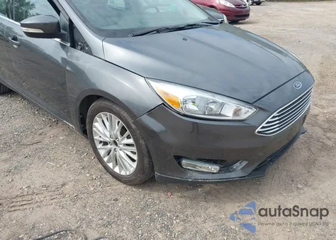 2017 Ford Focus Titanium z USA, uszkodzony, nr VIN 1FADP3J20HL238784